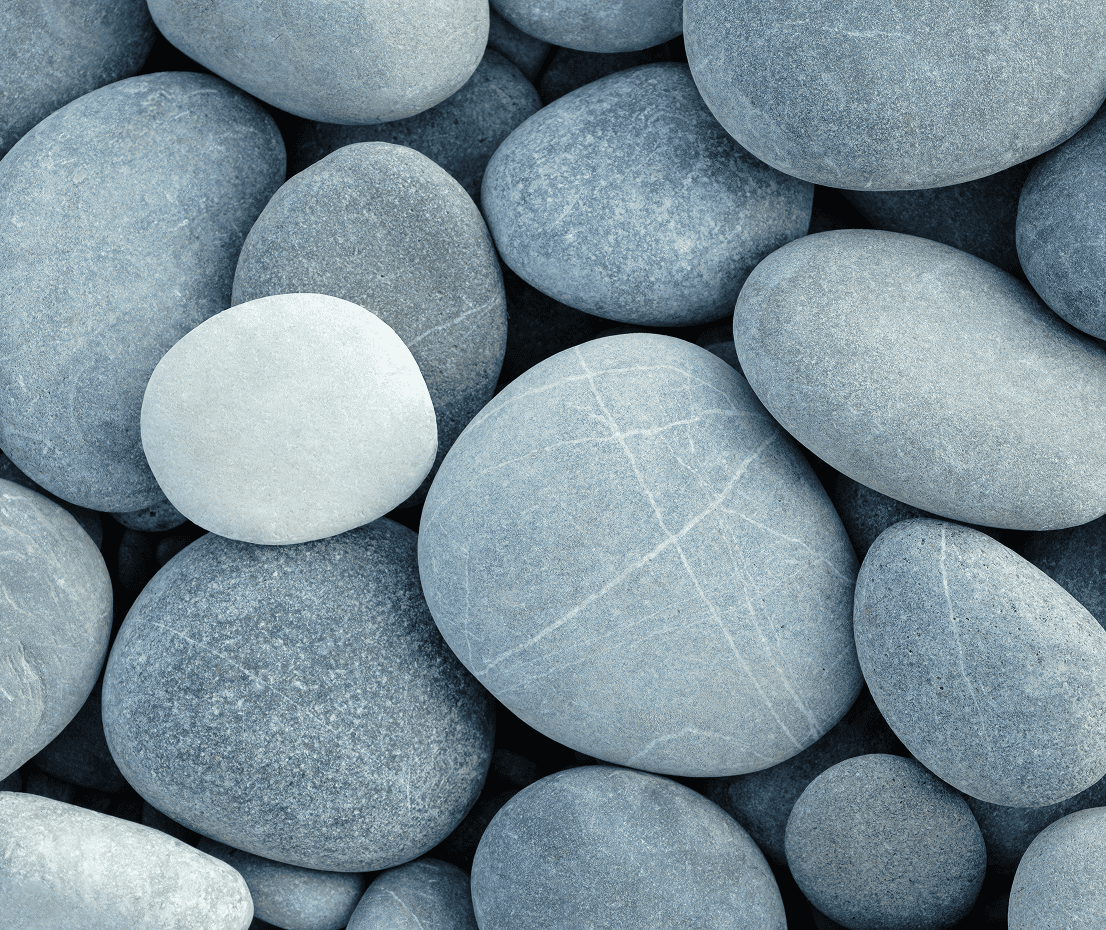Smooth gray pebbles close-up