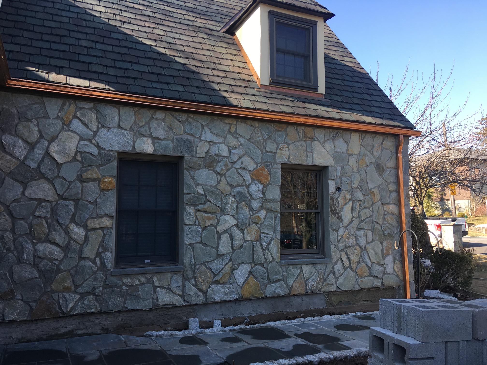 Rustic stone wall and windows