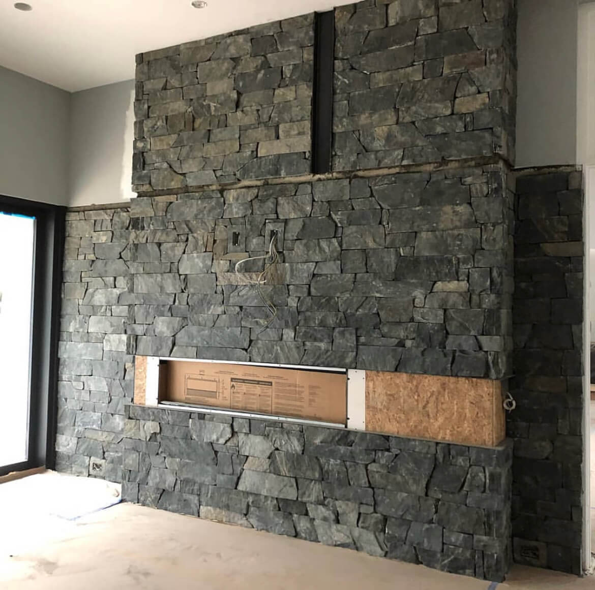 Modern stone fireplace construction